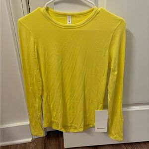 Yellow lululemon top w tags, size 6.